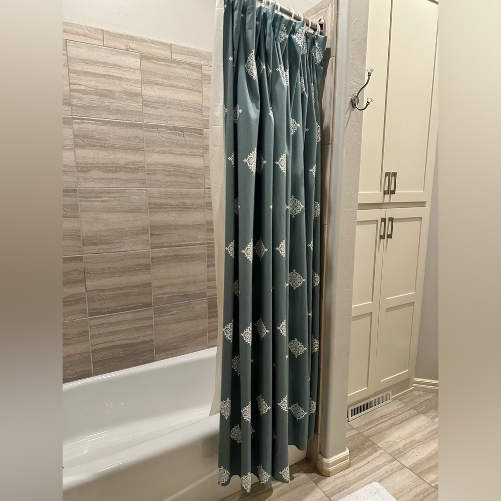Turquoise and white shower curtain
